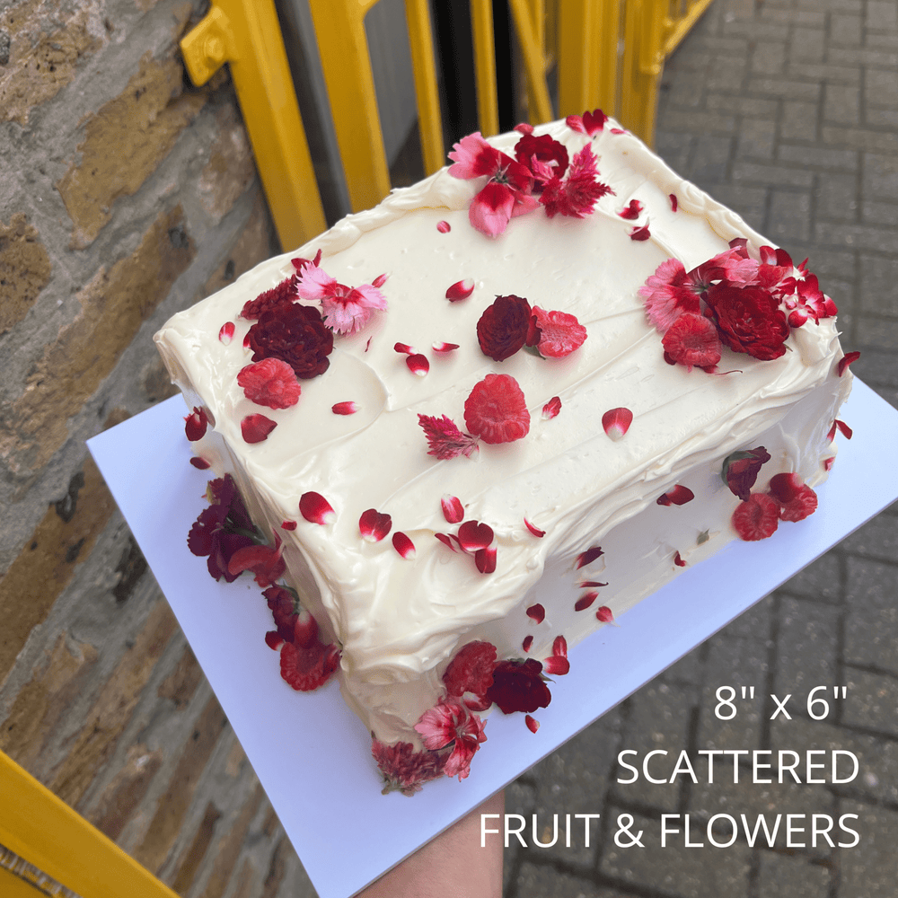 8x6 sheet cake with scattered fruit and flower decoration. London
